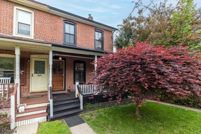 view of front of property with covered porch