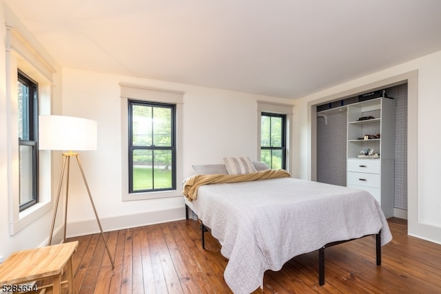 bedroom featuring a closet and hardwood / wood-style floors