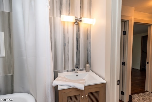 bathroom with wood-type flooring and vanity