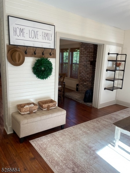 mudroom with dark hardwood / wood-style floors