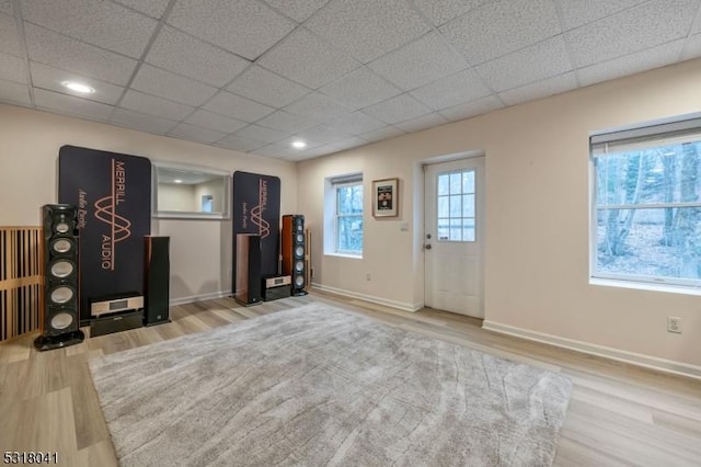 interior space featuring plenty of natural light and wood finished floors