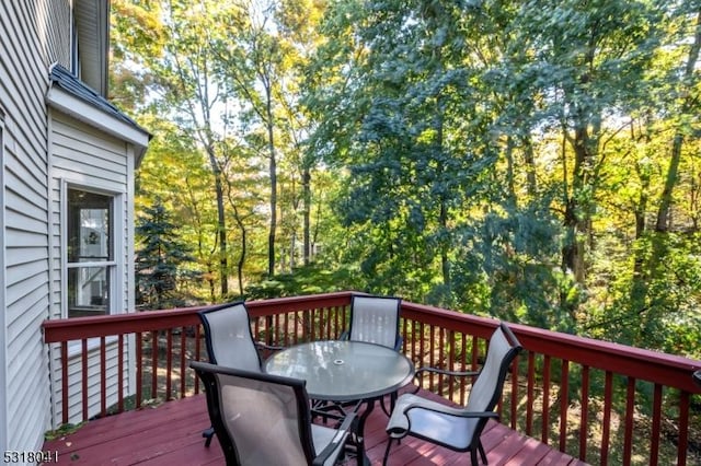 deck featuring outdoor dining space