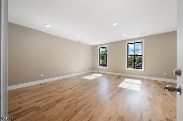 empty room featuring light hardwood / wood-style floors