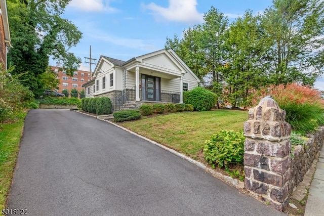 view of front of home with a front yard