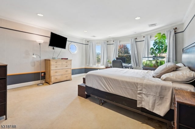 carpeted bedroom featuring ornamental molding