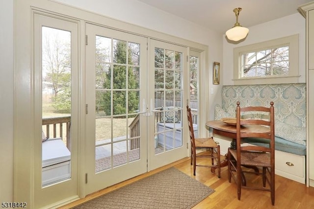 doorway with light wood-style flooring and french doors