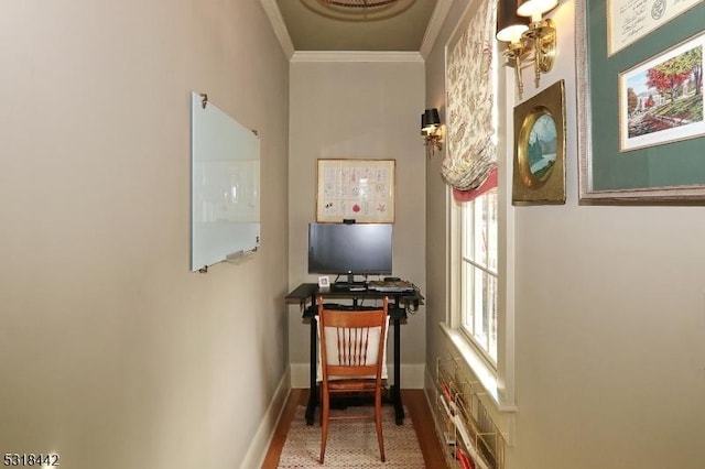 hallway with baseboards and ornamental molding