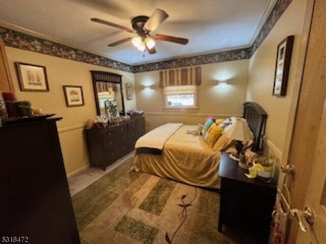 bedroom with wood finished floors