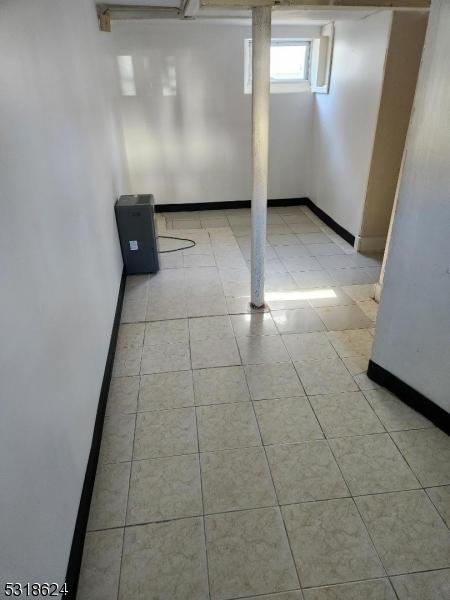 46 Highland Ave, Morris Twp, NJ 07960 - basement featuring light tile patterned floors and baseboards