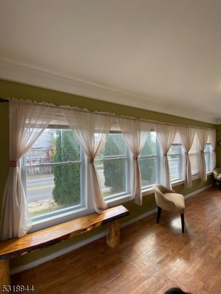 unfurnished room with wood-type flooring