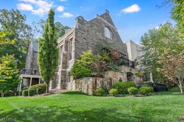 80 Claremont Rd Unit 802, Bernardsville Boro, NJ 07924 - view of side of home with a lawn, stone siding, and a balcony
