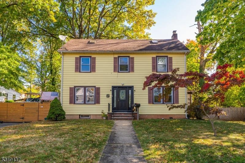 625 Locust St, Roselle Boro, NJ 07203 - view of front of home with a chimney