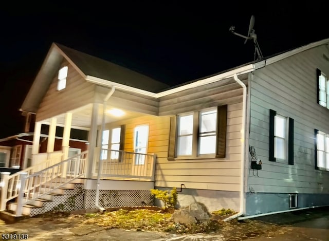 view of property exterior at twilight