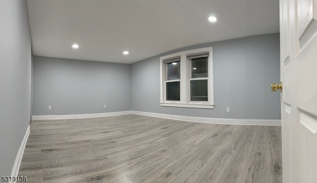 unfurnished room featuring light wood-type flooring