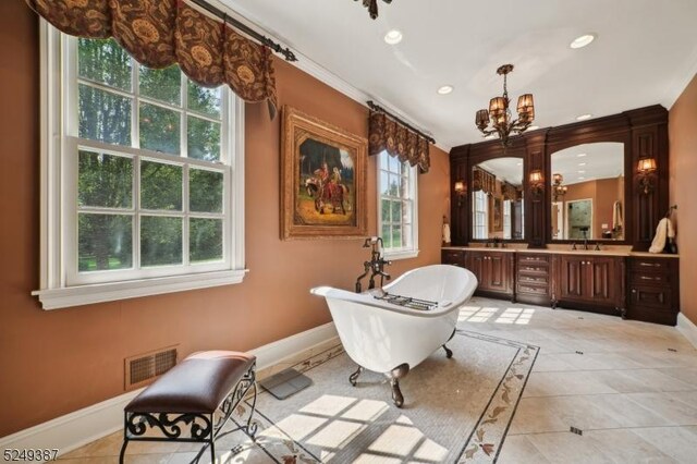 3 Winston Farm Ln, Mendham Twp, NJ 07931 - full bathroom featuring a chandelier, baseboards, a freestanding bath, inlaid floor details, and recessed lighting