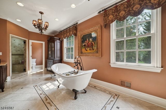 bathroom with vanity, separate shower and tub, a chandelier, and ornamental molding