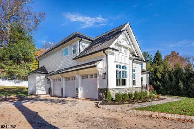 view of property exterior featuring a garage