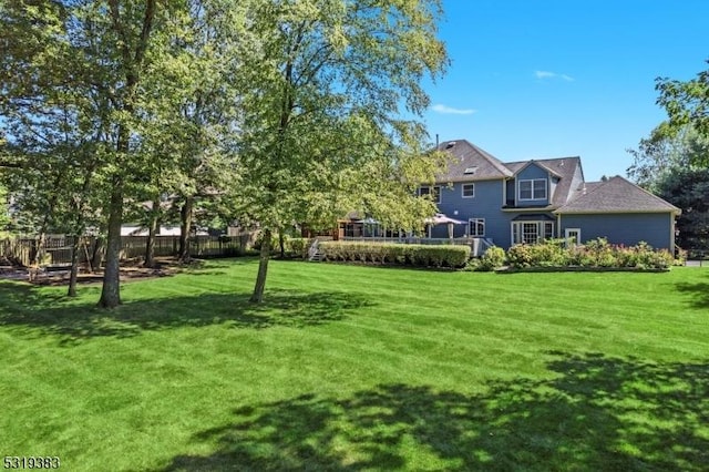 view of yard featuring fence