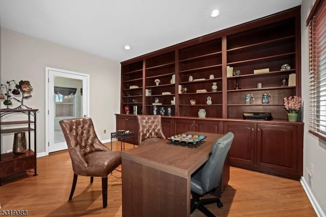 home office with light wood finished floors, baseboards, and recessed lighting