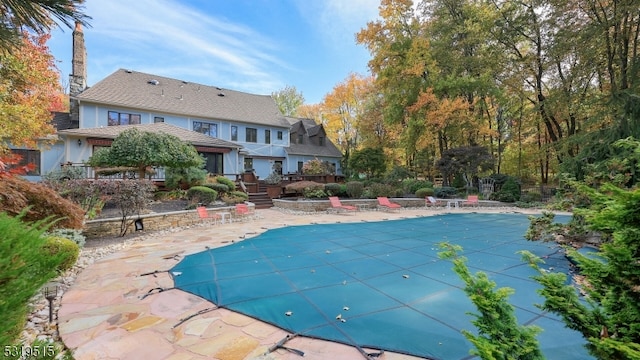 view of pool with a patio area