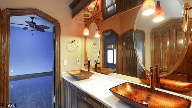 bathroom with vanity and ceiling fan