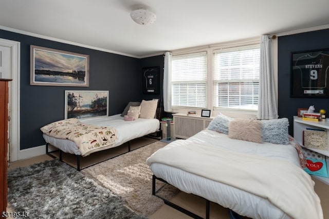 bedroom with crown molding