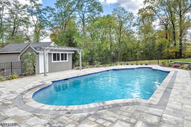 view of pool with fence, a patio area, a fenced in pool, and a pergola