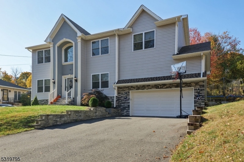 view of front of house with a garage