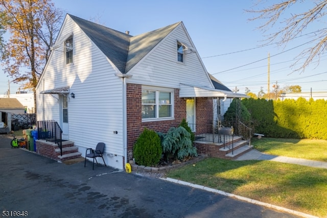 bungalow with a front lawn