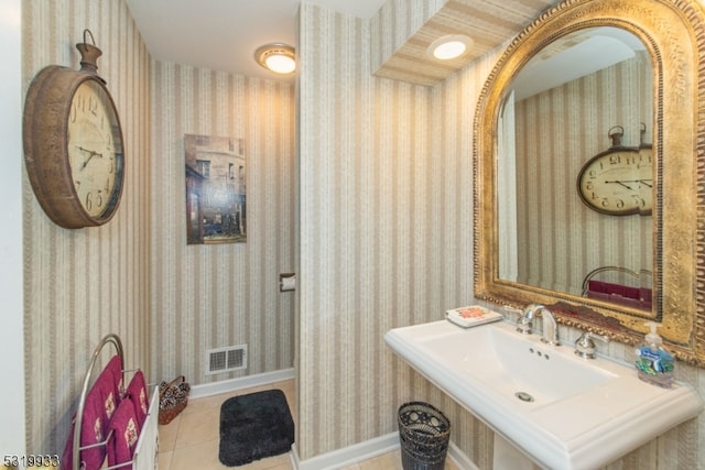 bathroom with tile patterned flooring