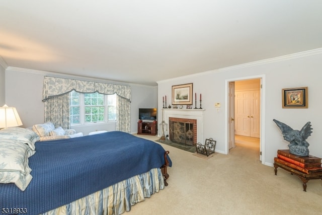 carpeted bedroom with crown molding and a fireplace