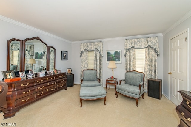 sitting room with crown molding and light carpet