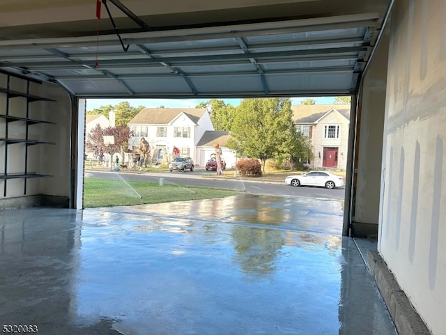 garage featuring a carport