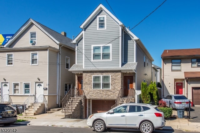 front of property with a garage