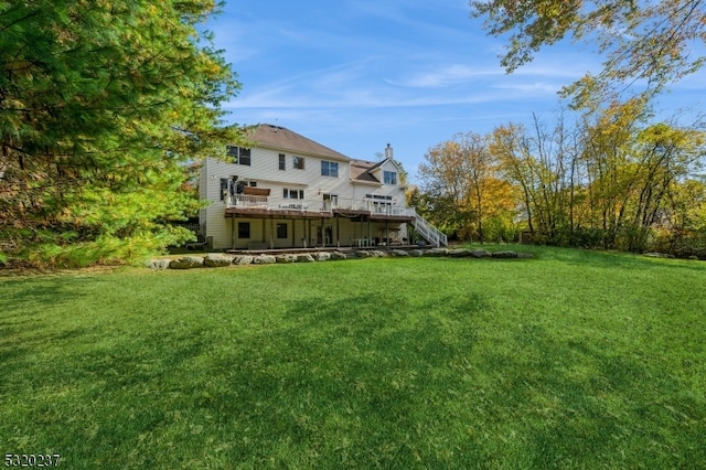 view of yard with a deck