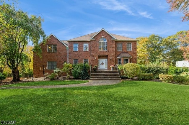 20 Crestview Ln, Sparta Twp, NJ 07871 - colonial home with a front lawn and brick siding