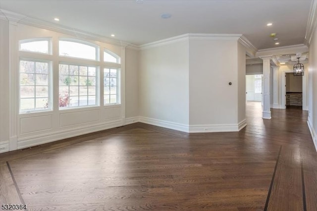 4 Hall Rd, Chester Twp, NJ 07930 - empty room with ornate columns, dark wood-style flooring, ornamental molding, healthy amount of natural light, and baseboards