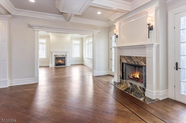 unfurnished living room featuring dark wood-type flooring, coffered ceiling, ornamental molding, beamed ceiling, and a high end fireplace