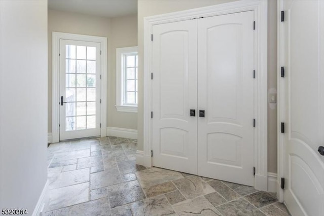 4 Hall Rd, Chester Twp, NJ 07930 - foyer featuring stone tile flooring and baseboards