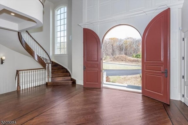 4 Hall Rd, Chester Twp, NJ 07930 - entrance foyer featuring wood finished floors, stairway, and a towering ceiling