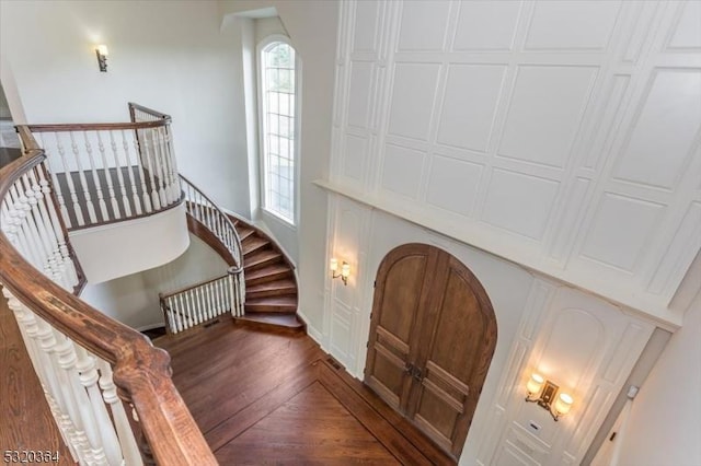 4 Hall Rd, Chester Twp, NJ 07930 - entrance foyer with wood finished floors, stairway, and arched walkways
