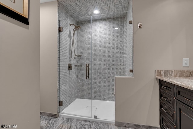 bathroom with vanity and an enclosed shower