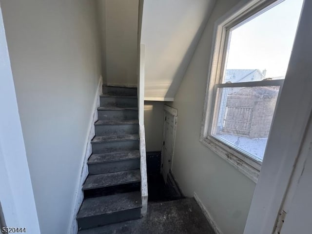 stairs featuring plenty of natural light