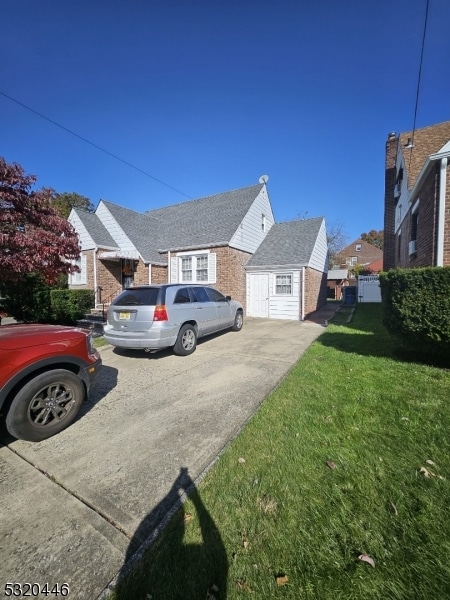 view of side of home featuring a yard