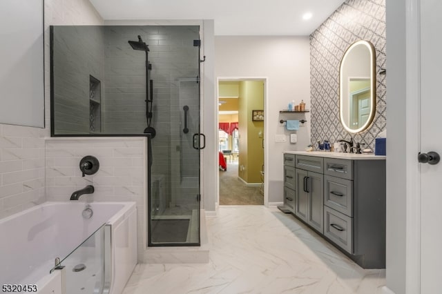 bathroom with vanity and plus walk in shower