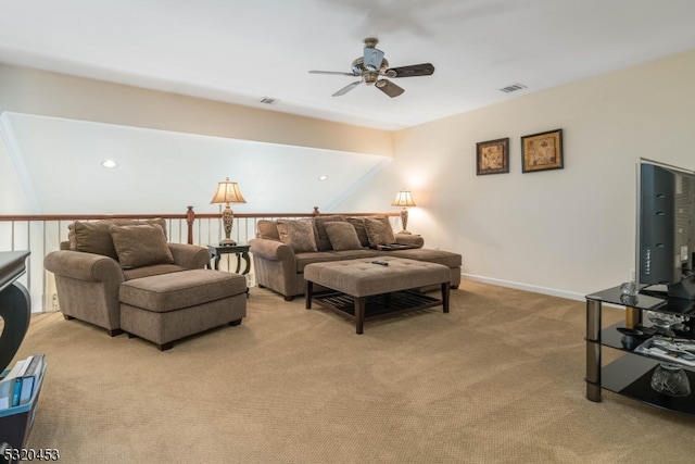 living room featuring light carpet and ceiling fan