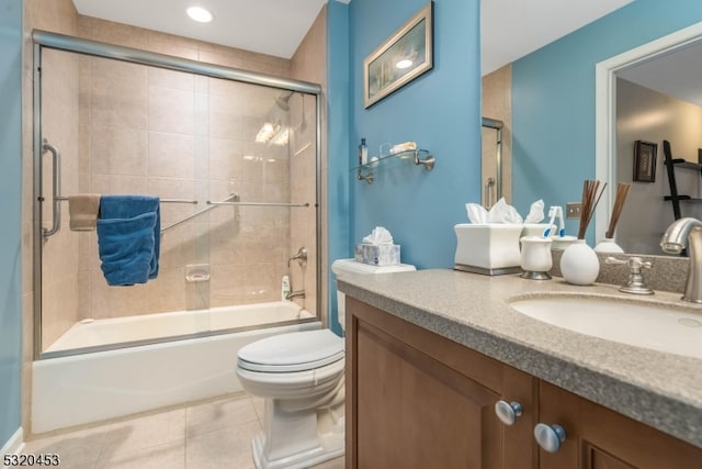 full bathroom with shower / bath combination with glass door, tile patterned flooring, toilet, and vanity