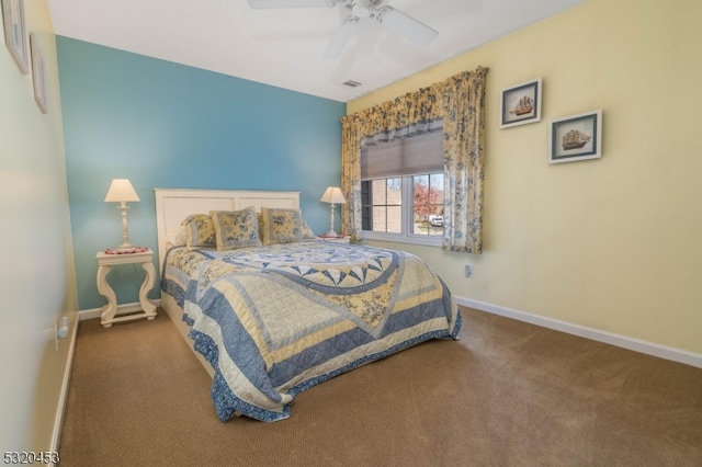 bedroom with ceiling fan and carpet floors