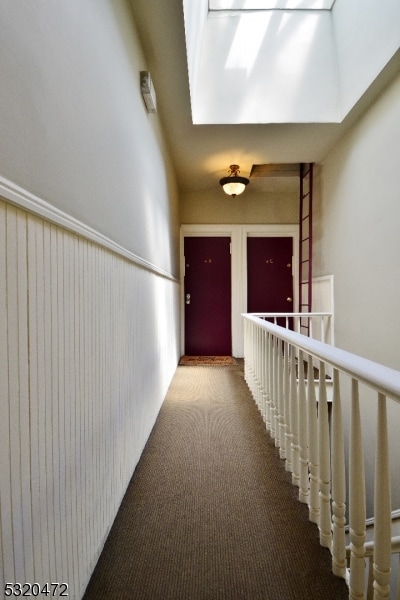 corridor featuring carpet floors