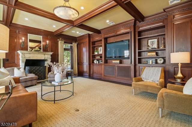 living room with beam ceiling, coffered ceiling, and built in features